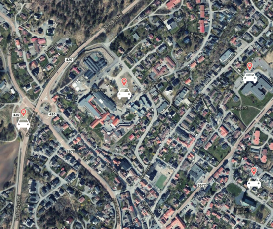 Dronefoto over Lillesand med markert alternativ parkering.