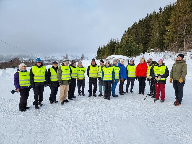 Folk i refleksvester, klar for trim